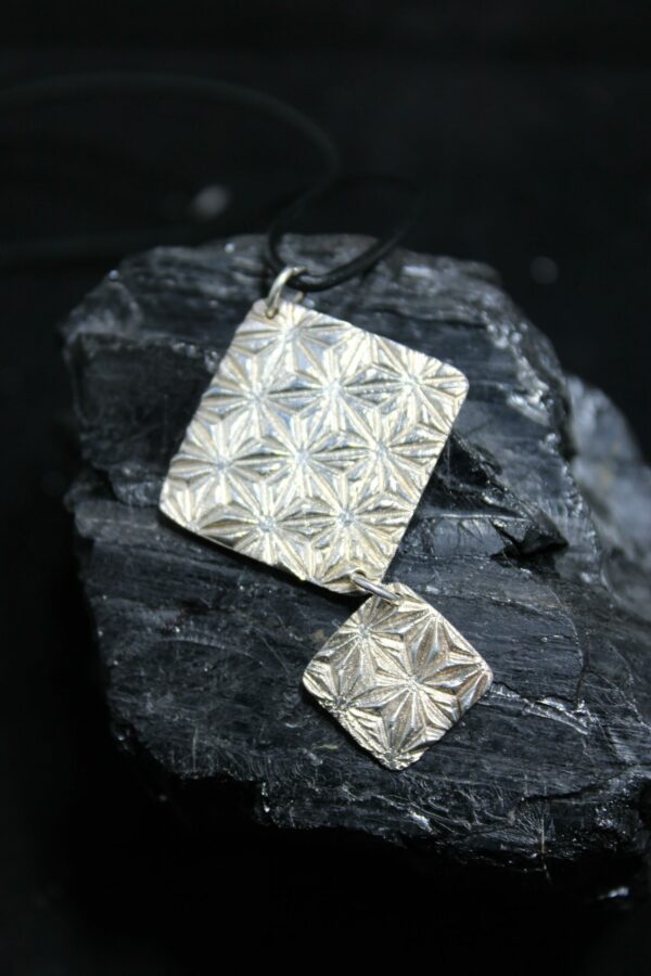 Pendentif en argent avec forme géométrique